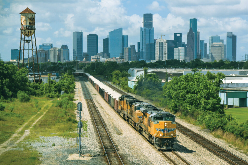 Union Pacific freight train with the downtown Houston skyline in the background